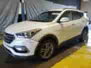2018 Hyundai Santa Fe 2.4L z VIN 5NMZUDLB1JH062301, wystawiony jako Copart lot #69343165 z przebiegiem 96 345 mil mil oraz Czysty tytuł • Clean title. Historia ofert i sprzedaży dostępna na DreamBid. Obrazek 1.
