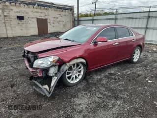 2011 Chevrolet Malibu LTZ with VIN 1G1ZE5E14BF298262, listed as a Copart auction lot 87244995 with 124,236 mi miles and Salvage title. Bid and sale history available at DreamBid. Image 1.