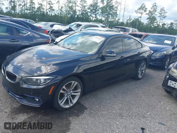 2018 BMW 4 Series 430i with VIN WBA4J1C51JBM10689, listed as a IAAI auction lot 42898652 with 111,516 mi miles and . Bid and sale history available at DreamBid. Image 2.