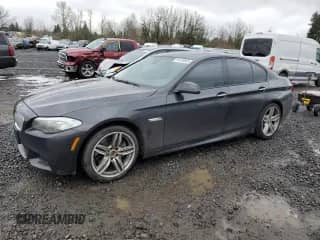 2012 BMW 5 Series 550i xDrive with VIN WBAFU9C52CC786992, listed as a Copart auction lot 49134605 with 94,459 mi miles and Clean title. Bid and sale history available at DreamBid. Image 1.