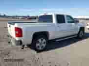 2009 Chevrolet Silverado 1500 LTZ z VIN 3GCEK33M99G242620, wystawiony jako Copart lot #68374975 z przebiegiem 159 424 mil mil oraz Szkoda całkowita • Salvage title. Historia ofert i sprzedaży dostępna na DreamBid. Obrazek 3.