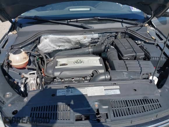 2012 Volkswagen Tiguan SE с VIN WVGBV7AX3CW003423, выставлен на аукционе IAAI как лот 43165016 с пробегом 127 332 миль миль и . История ставок и продаж доступна на DreamBid. Изображение 10.