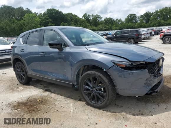 2024 Mazda CX-5 S Carbon Edition z VIN JM3KFBCL6R0531894, wystawiony jako Copart lot #60815975 z przebiegiem 21 309 mil mil oraz Czysty tytuł • Clean title. Historia ofert i sprzedaży dostępna na DreamBid. Obrazek 4.