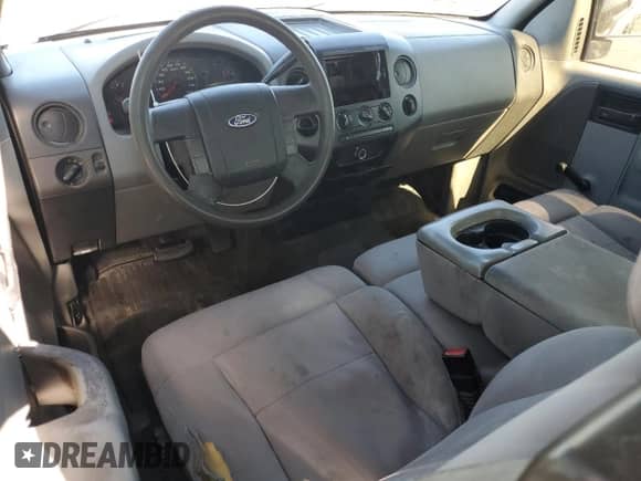 2005 Ford F-150 STX z VIN 1FTRX02W75KB65639, wystawiony jako Copart lot #82519815 z przebiegiem 151 351 mil mil oraz Szkoda całkowita • Salvage title. Historia ofert i sprzedaży dostępna na DreamBid. Obrazek 8.