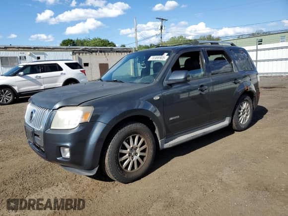 2008 Mercury Mariner Premier with VIN 4M2CU971X8KJ35114, listed as a Copart auction lot 70386905 with 148,184 mi miles and Salvage title. Bid and sale history available at DreamBid. Image 1.