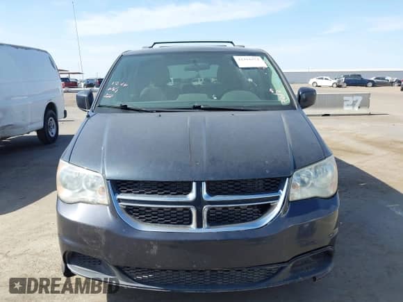 2014 Dodge Grand Caravan SXT with VIN 2C4RDGCG4ER182568, listed as a IAAI auction lot 42415574 with 181,227 mi miles and . Bid and sale history available at DreamBid. Image 6.