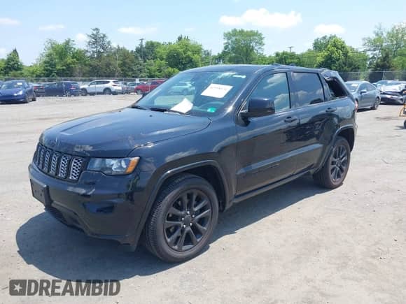 2019 Jeep Grand Cherokee Altitude with VIN 1C4RJFAG7KC606934, listed as a IAAI auction lot 42598576 with 69,916 mi miles and . Bid and sale history available at DreamBid. Image 17.
