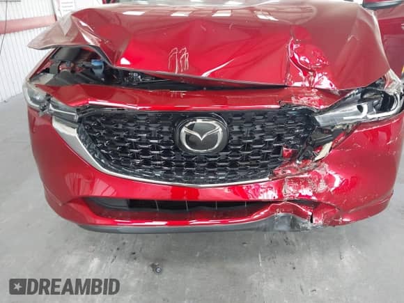 2024 Mazda CX-5 S Preferred z VIN JM3KFBCM8R0385569, wystawiony jako IAAI lot #42883633 z przebiegiem 9 613 mil mil oraz . Historia ofert i sprzedaży dostępna na DreamBid. Obrazek 6.