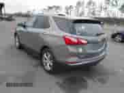 2018 Chevrolet Equinox Premier with VIN 3GNAXMEV7JS547991, listed as a IAAI auction lot 41208640 with 98,879 mi miles and . Bid and sale history available at DreamBid. Image 3.
