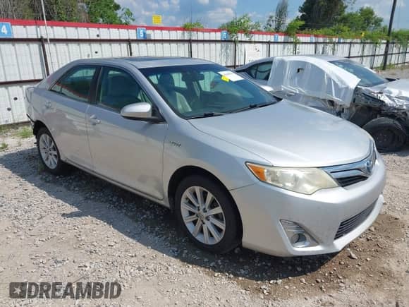 2014 Toyota Camry LE z VIN 4T1BD1FK4EU102991, wystawiony jako IAAI lot #43068815 z przebiegiem 242 935 mil mil oraz . Historia ofert i sprzedaży dostępna na DreamBid. Obrazek 1.