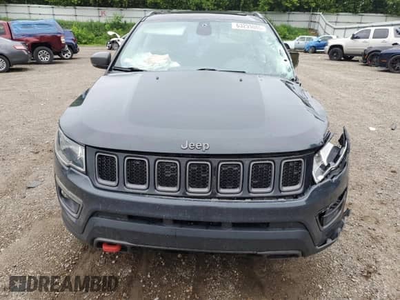 2017 Jeep Compass Trailhawk with VIN 3C4NJDDBXHT688190, listed as a Copart auction lot 63299085 with 104,758 mi miles and Clean title. Bid and sale history available at DreamBid. Image 5.