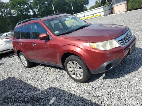 2011 Subaru Forester X Premium with VIN JF2SHADC6BG759257, listed as a Copart auction lot 69250535 with 169,230 mi miles and Clean title. Bid and sale history available at DreamBid. Image 4.