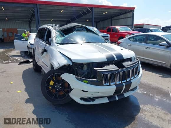2014 Jeep Grand Cherokee SRT-8 с VIN 1C4RJFDJ3EC451648, выставлен на аукционе IAAI как лот 42968131 с пробегом 121 948 миль миль и . История ставок и продаж доступна на DreamBid. Изображение 6.