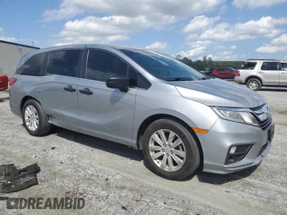 2020 Honda Odyssey LX with VIN 5FNRL6H26LB044419, listed as a Copart auction lot 60593195 with 216,454 mi miles and Salvage title. Bid and sale history available at DreamBid. Image 4.
