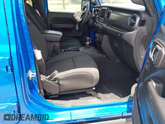 2023 Jeep Wrangler Sport S with VIN 1C4HJXDG7PW695651, listed as a IAAI auction lot 42585722 with 25,802 mi miles and . Bid and sale history available at DreamBid. Image 5.