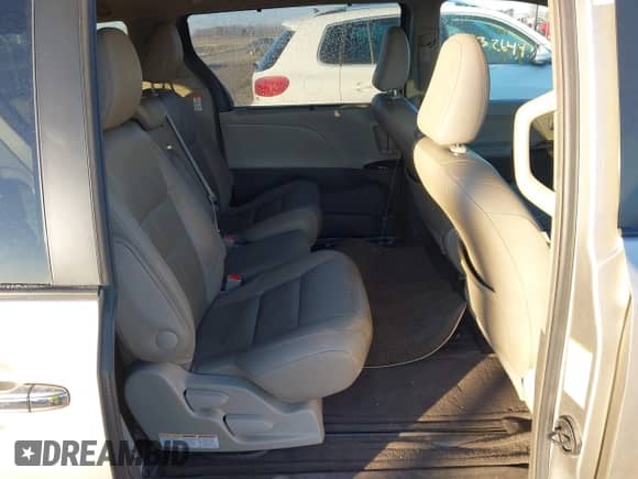 2016 Toyota Sienna XLE with VIN 5TDYK3DC8GS713481, listed as a IAAI auction lot 41239824 with 176,935 mi miles and . Bid and sale history available at DreamBid. Image 8.