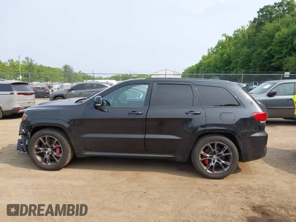 2014 Jeep Grand Cherokee SRT-8 с VIN 1C4RJFDJ1EC517310, выставлен на аукционе IAAI как лот 42383955 с пробегом 104 701 миль миль и . История ставок и продаж доступна на DreamBid. Изображение 14.