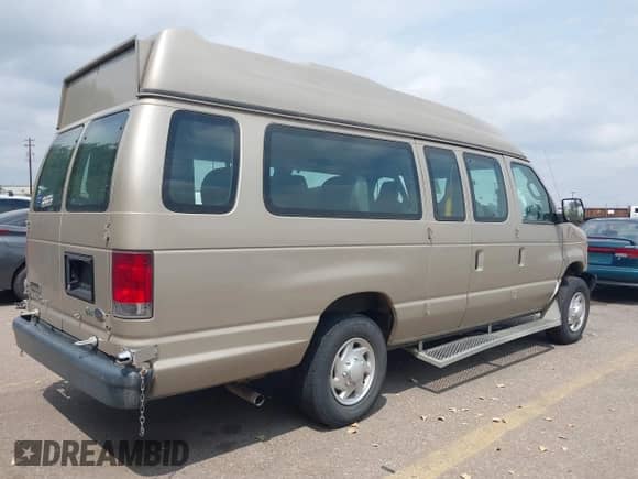 2014 Ford Econoline Cargo Commercial with VIN 1FTNS2EW6EDA35117, listed as a IAAI auction lot 43042985 with Not provided miles and . Bid and sale history available at DreamBid. Image 4.