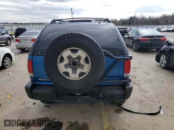 2001 Chevrolet Blazer LS z VIN 1GNCT18W61K158519, wystawiony jako Copart lot #50435495 z przebiegiem Nie podano mil oraz Nie do naprawy • Non repairable. Historia ofert i sprzedaży dostępna na DreamBid. Obrazek 6.