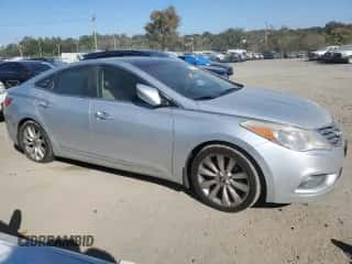 2013 Hyundai Azera с VIN KMHFH4JG4DA198549, выставлен на аукционе Copart как лот 76779744 с пробегом 213 433 миль миль и Чистый • Clean title. История ставок и продаж доступна на DreamBid. Изображение 4.