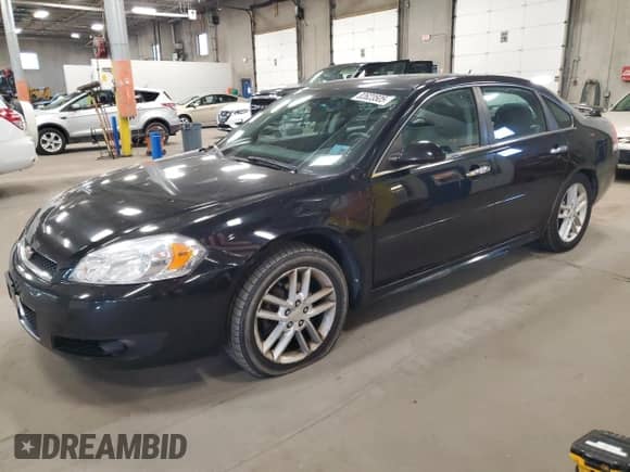 2013 Chevrolet Impala LTZ with VIN 2G1WC5E33D1155274, listed as a Copart auction lot 82623505 with 165,910 mi miles and Salvage title. Bid and sale history available at DreamBid. Image 1.