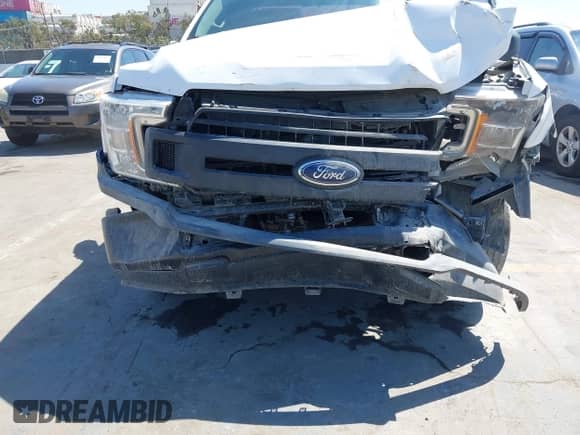 2018 Ford F-150 XL z VIN 1FTMF1CB2JKC34648, wystawiony jako IAAI lot #43102300 z przebiegiem 85 064 mil mil oraz . Historia ofert i sprzedaży dostępna na DreamBid. Obrazek 6.