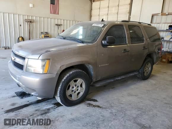 2007 Chevrolet Tahoe LTZ z VIN 1GNFC13J77R202004, wystawiony jako Copart lot #82496575 z przebiegiem Nie podano mil oraz Czysty tytuł • Clean title. Historia ofert i sprzedaży dostępna na DreamBid. Obrazek 1.