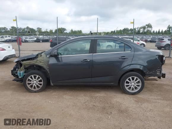 2020 Chevrolet Sonic LT with VIN 1G1JD5SB9L4127856, listed as a IAAI auction lot 42952943 with 66,882 mi miles and . Bid and sale history available at DreamBid. Image 15.
