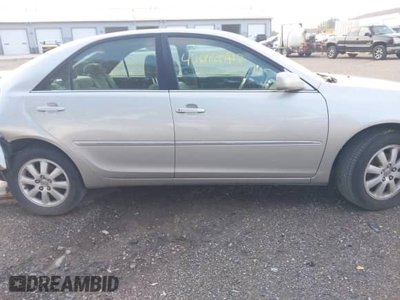 2004 Toyota Camry LE with VIN 4T1BE32K14U896992, listed as a IAAI auction lot 42709172 with 153,248 mi miles and . Bid and sale history available at DreamBid. Image 14.
