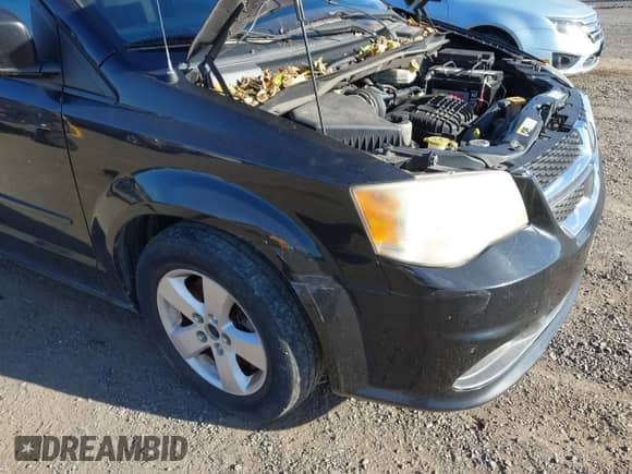 2013 Dodge Grand Caravan SE with VIN 2C4RDGBG9DR715580, listed as a IAAI auction lot 43457075 with 199,606 mi miles and . Bid and sale history available at DreamBid. Image 6.
