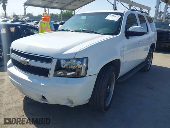 2007 Chevrolet Tahoe LTZ с VIN 1GNFC130X7R105323, выставлен на аукционе IAAI как лот 42533832 с пробегом 230 946 миль миль и . История ставок и продаж доступна на DreamBid. Изображение 2.