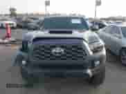 2021 Toyota Tacoma SR5 z VIN 3TMDZ5BN2MM108586, wystawiony jako IAAI lot #41604953 z przebiegiem 65 422 mil mil oraz . Historia ofert i sprzedaży dostępna na DreamBid. Obrazek 12.