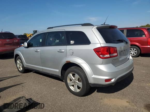 2012 Dodge Journey SXT z VIN 3C4PDDBG9CT215095, wystawiony jako Copart lot #84914405 z przebiegiem 189 885 mil mil oraz Czysty tytuł • Clean title. Historia ofert i sprzedaży dostępna na DreamBid. Obrazek 2.