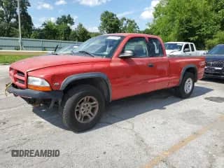2002 Dodge Dakota z VIN 1B7GL12X32S528404, wystawiony jako Copart lot #62110475 z przebiegiem Nie podano mil oraz Szkoda całkowita • Salvage title. Historia ofert i sprzedaży dostępna na DreamBid. Obrazek 1.
