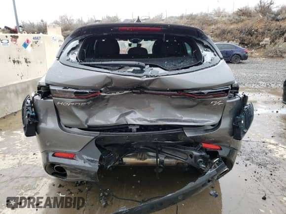 2024 Dodge Hornet R/T z VIN ZACPDFCW8R3A30500, wystawiony jako Copart lot #47810855 z przebiegiem 13 206 mil mil oraz Nie do naprawy • Non repairable. Historia ofert i sprzedaży dostępna na DreamBid. Obrazek 6.