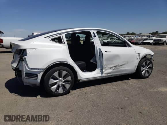 2023 Tesla Model Y Long Range с VIN 7SAYGDEE0PF637947, выставлен на аукционе Copart как лот 61927575 с пробегом 57 538 миль миль и Списание • Salvage title. История ставок и продаж доступна на DreamBid. Изображение 3.