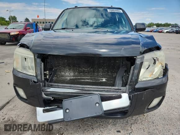 2008 Mercury Mariner Premier with VIN 4M2CU97108KJ12909, listed as a Copart auction lot 70864465 with 128,018 mi miles and Salvage title. Bid and sale history available at DreamBid. Image 5.