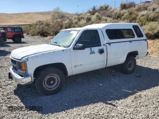 1995 Chevrolet Silverado 2500 с VIN 1GCGC24K4SE232295, выставлен на аукционе Copart как лот 80211055 с пробегом 293 134 миль миль и Списание • Salvage title. История ставок и продаж доступна на DreamBid. Изображение 1.