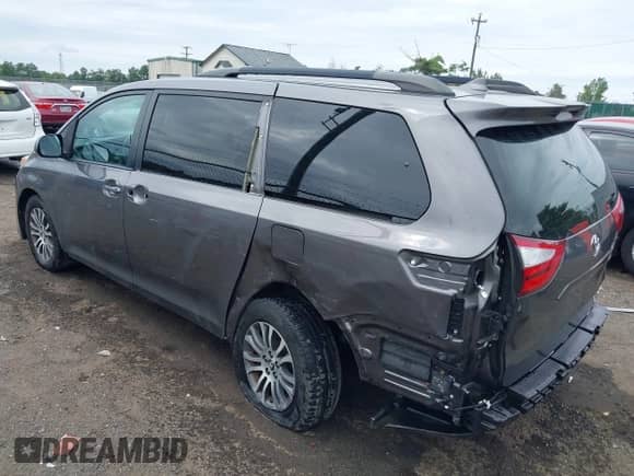 2018 Toyota Sienna XLE Auto Access Seat with VIN 5TDYZ3DC8JS939975, listed as a IAAI auction lot 42913601 with 99,360 mi miles and . Bid and sale history available at DreamBid. Image 3.