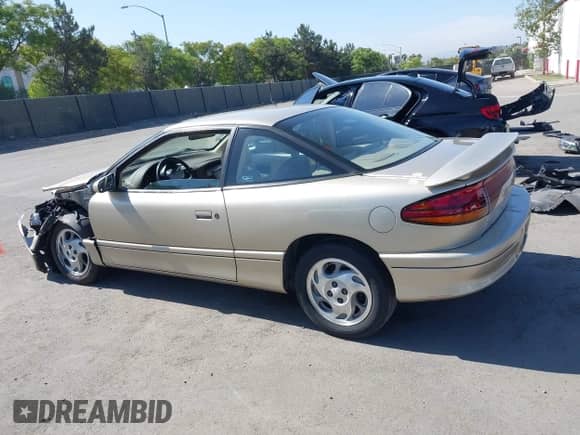 1996 Saturn 2dr Coupe with VIN 1G8ZH1271TZ371582, listed as a IAAI auction lot 42385058 with 152,207 mi miles and . Bid and sale history available at DreamBid. Image 14.