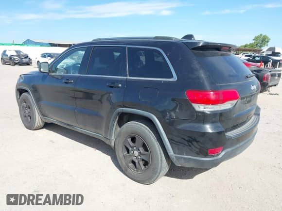 2014 Jeep Grand Cherokee Laredo with VIN 1C4RJEAG0EC239678, listed as a IAAI auction lot 42830671 with 222,437 mi miles and . Bid and sale history available at DreamBid. Image 3.