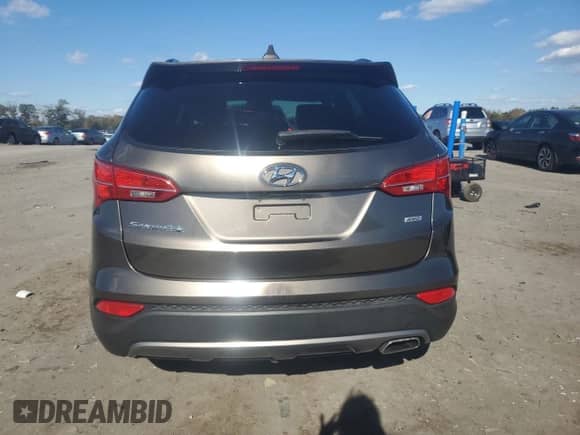 2014 Hyundai Santa Fe с VIN 5XYZUDLB8EG224988, выставлен на аукционе Copart как лот 87418195 с пробегом 94 772 миль миль и Списание • Salvage title. История ставок и продаж доступна на DreamBid. Изображение 6.