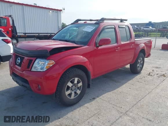 2011 Nissan Frontier Pro-4X with VIN 1N6AD0EV6BC445628, listed as a IAAI auction lot 42901604 with 71,087 mi miles and . Bid and sale history available at DreamBid. Image 2.
