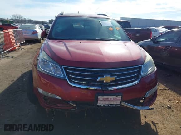 2013 Chevrolet Traverse LT z VIN 1GNKRGKD5DJ175049, wystawiony jako IAAI lot #41598229 z przebiegiem 167 239 mil mil oraz . Historia ofert i sprzedaży dostępna na DreamBid. Obrazek 11.
