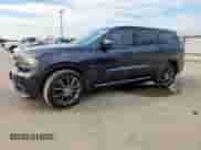 2015 Dodge Durango R/T with VIN 1C4SDHCT4FC176283, listed as a Copart auction lot 69117905 with 180,329 mi miles and Salvage title. Bid and sale history available at DreamBid. Image 1.