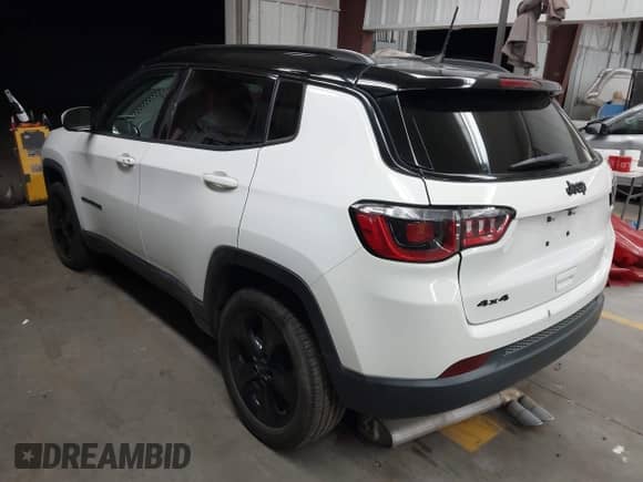 2019 Jeep Compass Latitude with VIN 3C4NJDBB7KT754348, listed as a IAAI auction lot 42617408 with 59,670 mi miles and . Bid and sale history available at DreamBid. Image 3.