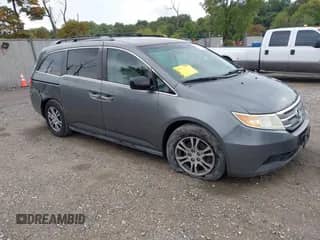 2012 Honda Odyssey EX with VIN 5FNRL5H40CB083650, listed as a IAAI auction lot 43283741 with 164,693 mi miles and . Bid and sale history available at DreamBid. Image 1.