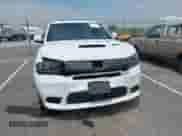 2018 Dodge Durango SRT with VIN 1C4SDJGJ2JC434843, listed as a IAAI auction lot 42434327 with 144,483 mi miles and . Bid and sale history available at DreamBid. Image 6.
