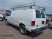 2013 Ford Econoline Cargo Commercial with VIN 1FTNE2EW8DDB33894, listed as a IAAI auction lot 42841415 with 224,026 mi miles and . Bid and sale history available at DreamBid. Image 3.