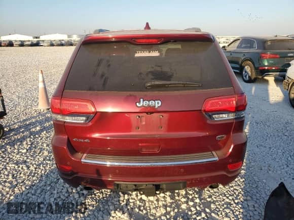 2018 Jeep Grand Cherokee Overland with VIN 1C4RJFCT3JC453784, listed as a Copart auction lot 71921944 with 56,097 mi miles and Salvage title. Bid and sale history available at DreamBid. Image 6.
